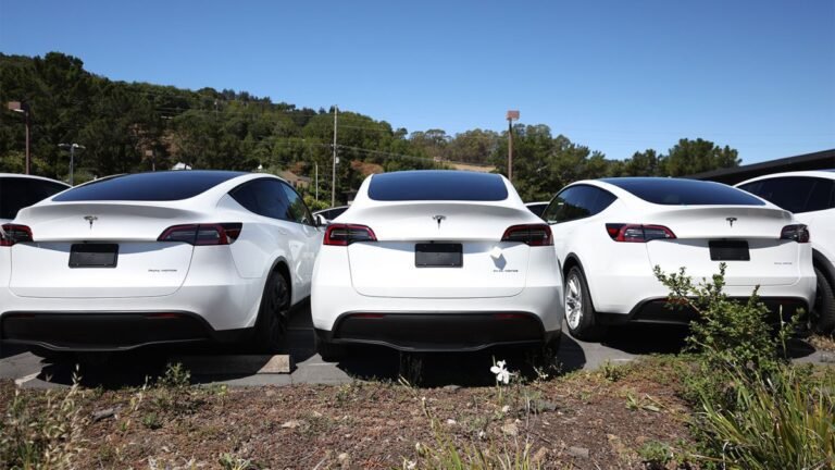 Elon Musk Embraces Tesla's Charging Team After Beating Major Automakers
